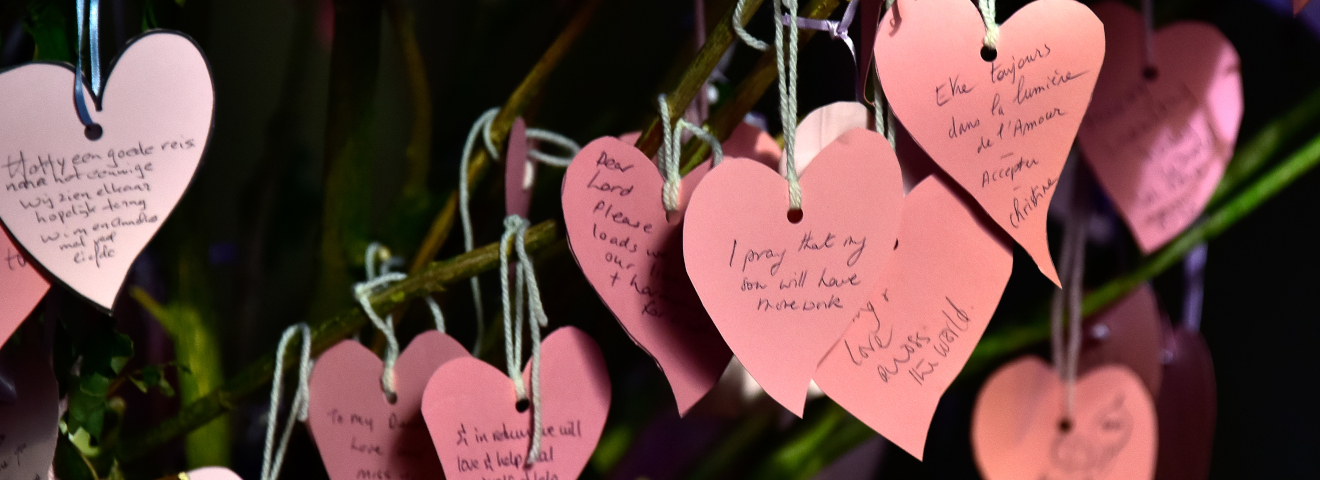 paper hearts hanging in St James with Prayers written on them