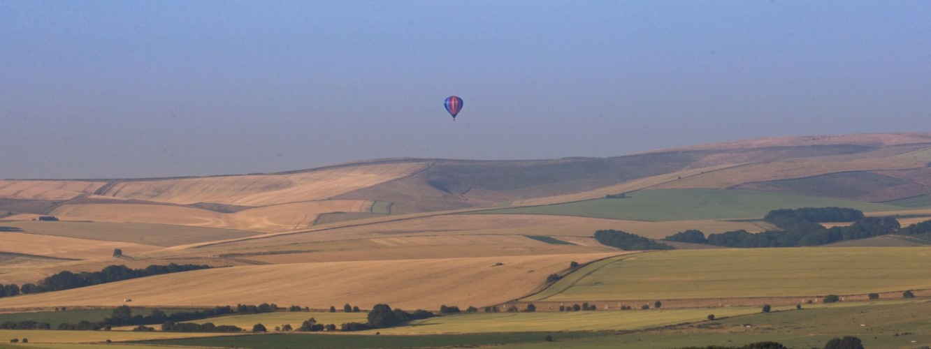 balloon floating above the Wiltshire downs