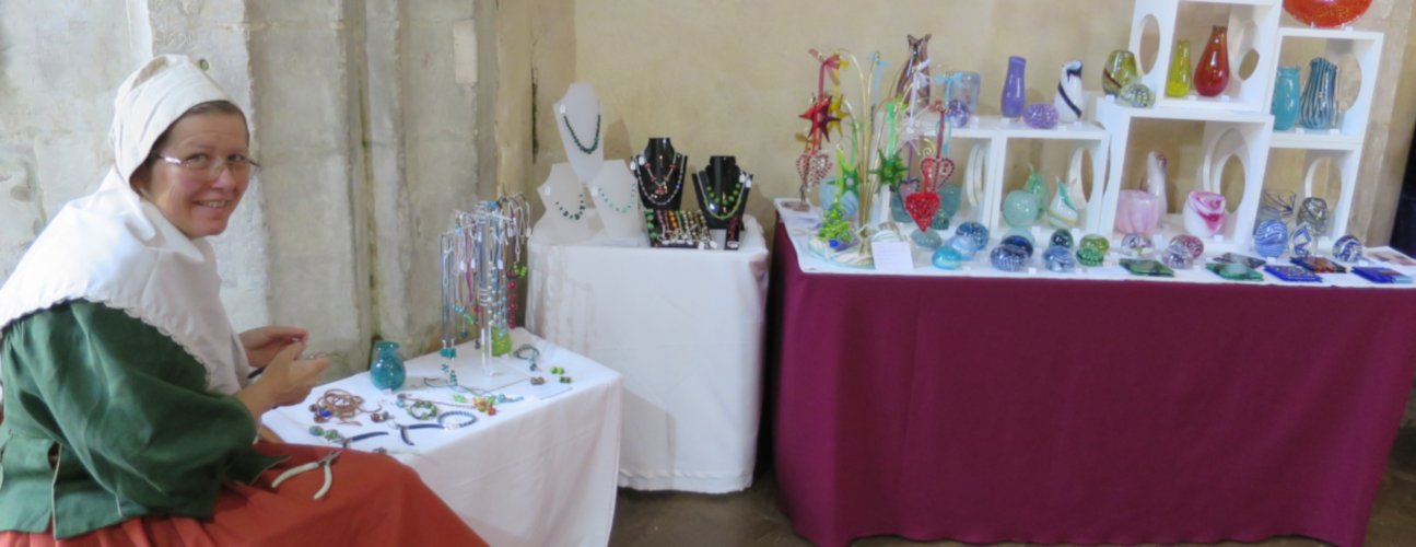 craftswoman making glass jewellery at the art fayre