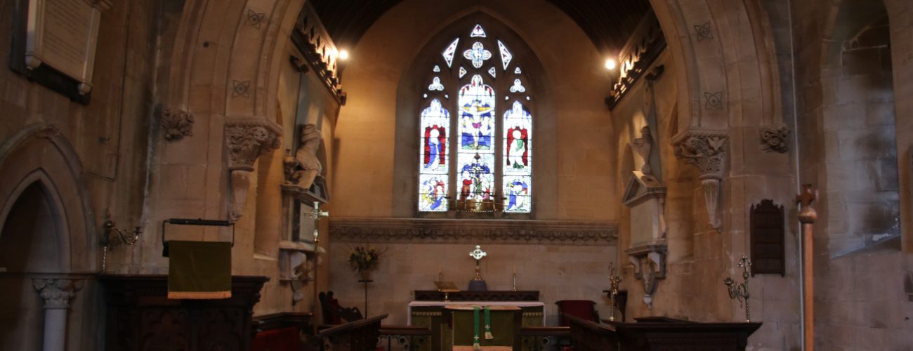 pulpit, altar and stained glass window at east Kennet